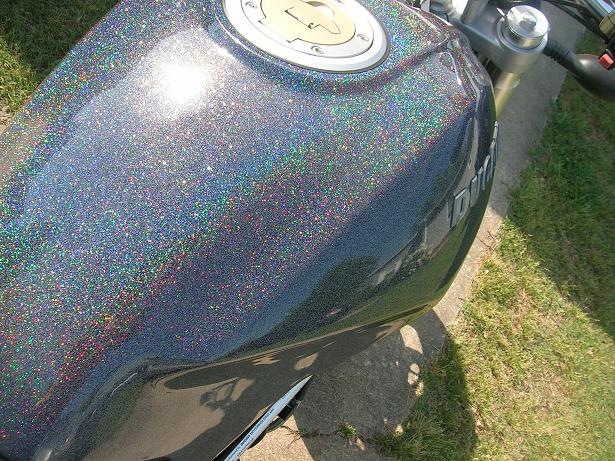 [The brilliant coloring of the metallic in the paint when in the sunlight.]